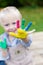 Playful child showing colorful hand