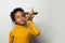 Playful clever black child boy with plane model