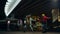 Playful couple having fun on street. Pair playing funny fight under bridge.