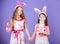 Playful girls sisters celebrate easter. Spring holiday. Happy childhood. Easter day. Easter activities for children