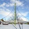 Playground against mountain and sky in winter