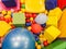 Playground, children`s slides, a play area of colorful plastic balls. Cheerful children`s leisure with balls in the play pool, o