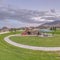 Playground and eating area near homes and mountain