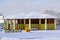 Playground in kindergarten for children in winter with snow cove