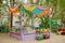 Playground with sandbox with canopy with shovels, buckets for children`s games