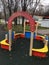 Playground, slides, swings, a ladder in city park