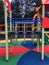 Playground, slides, swings, a ladder in city park