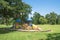 Playground under lush of Oak tree