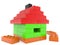 Playhouse from colored toy bricks on white