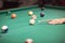 Playing billiard - Close-up shot billiard balls on green table