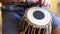 Playing Bongo drum close up HD stock footage. Hand tapping a Bongo drum in close up.