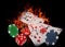 Playing cards and casino chips on fire. poker concept