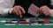 Playing cards in a casino, raising bets with chips. Success and victory. Poker, blackjack, Texas poker. Las Vegas . All in Betting