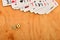 Playing and cards dice wooden background.