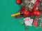 Playing cards and poker chips near a Christmas tree