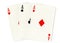 Playing cards showing three aces.