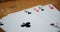 Playing cards on wooden table 4k