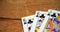 Playing cards on wooden table 4k