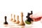 Playing chess - a hand moving chess pieces on a chessboard