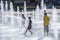 Playing children at the lower market place with fountains