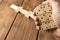 Playing dominoes on a wooden table. Mans hand with domino. Leisure games concept. Selective focus