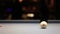 Playing Eight-ball pool billiards in a bar