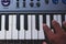 Playing Electronic Keyboard from top view composition in Music Recording studio close up on hands. Playing electronic Piano