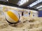 playing indoor beach volleyball