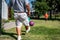 Playing kickball with grandpa in the backyard