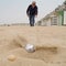 Playing \'petanque\' on the beach