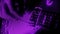 Playing a Purple Particles Guitar Abstract Motion Background V2