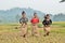 Playing sack race in dry rice fields