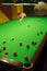 Playing snooker