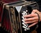 Playing traditional bandoneon.