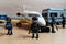 Playmobil figurines in scene representing police forces surrounding a plane.