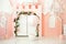 Playroom with pink castle tent for children. Children`s room for a little princess. Decorations for a children`s party. A room wit