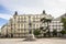 Plaza de las Cortes with statue of Miguel de Cervantes and to the building Plus Ultra Seguros, Madrid, Spain