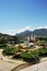 Plaza with monument and garden with flowers in the city of Tingo Maria