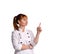 Pleasant female doctor or nurse looking up with smile pointing on something with index finger. , copy space