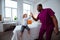 Pleasant little girl giving high five to professional pediatrician