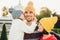 Pleasant looking little girl being thankful to her father for buying new bicycle, kisses him in cheek. Young family walk together