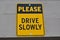 Please Drive Slowly Sign