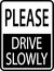 Please Drive Slowly Sign On White Background