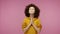 Please god, I`m begging! Upset girl afro hairstyle in hoodie appealing to heaven with pleading imploring eyes, keeping prayer gest