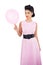 Pleased black hair model holding a pink balloon