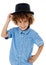 Pleased to make your acquaintance. Studio shot of a cute little boy wearing a funky hat against a white background.