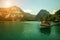 Pleasure boat and beautiful panorama of lake and mountains