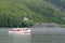 Pleasure boat cruising on a lake in Wales.