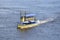 Pleasure boat riding tourists on a river