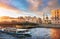 A pleasure boat with tourists at the Belinsky bridge across the Fontanka River